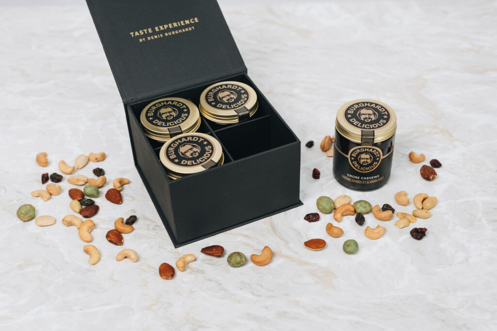 Burghardt Delicious Premium Box filled with four glass jars of nuts and nut mixes